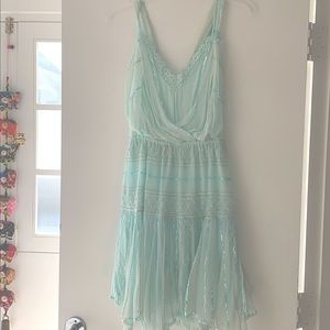 Mini dress crossed in the back.